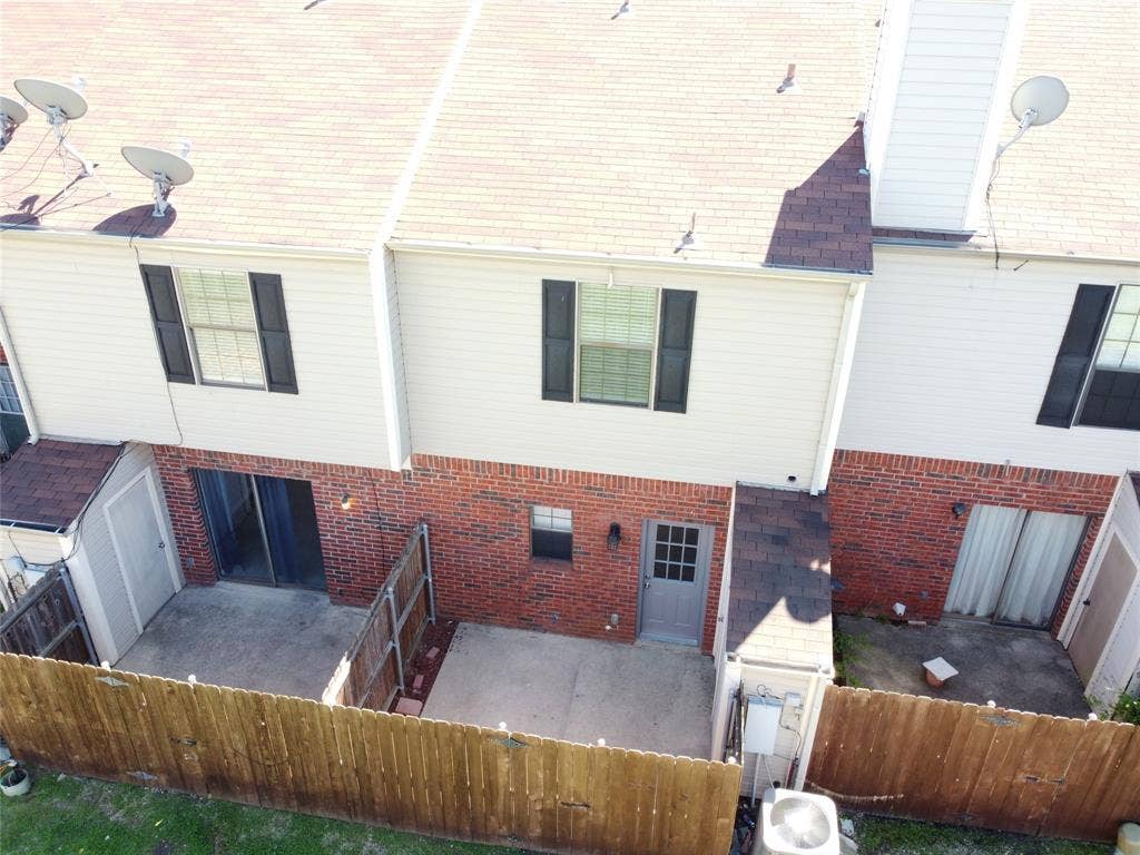 216 Samuel Boulevard, #j3, Coppell, TX 75019 Brick and siding exterior with concrete patios and fenced outdoor spaces