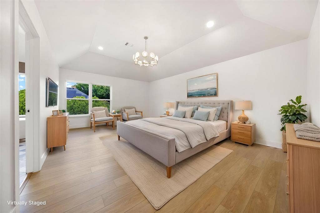 7504 Hughes Drive, Plano, TX 75024 Vaulted ceiling with recessed lighting and a contemporary chandelier