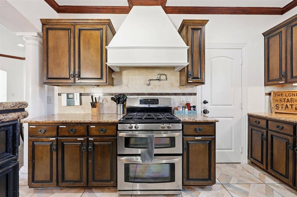 5102 Mission Avenue, #5102B, Dallas, TX 75206 Kitchen on level 2 with gas stove, double oven and pot filler