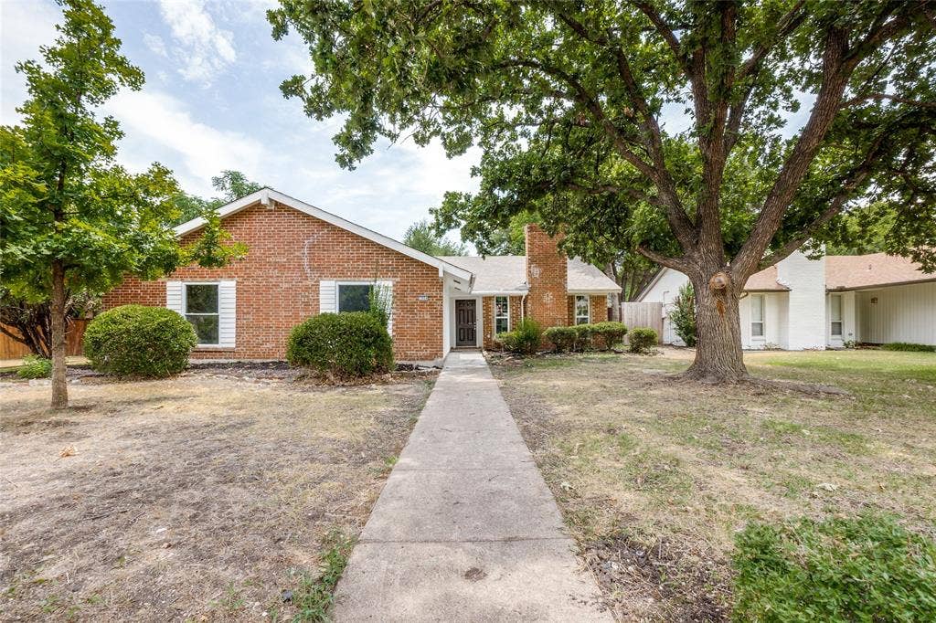 1904 Richland Drive, Richardson, TX 75081 Brick exterior with white window shutters