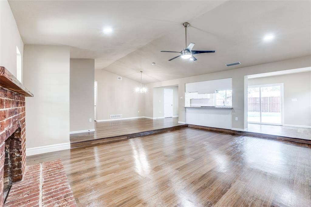 1904 Richland Drive, Richardson, TX 75081 Brick fireplace with wood mantel