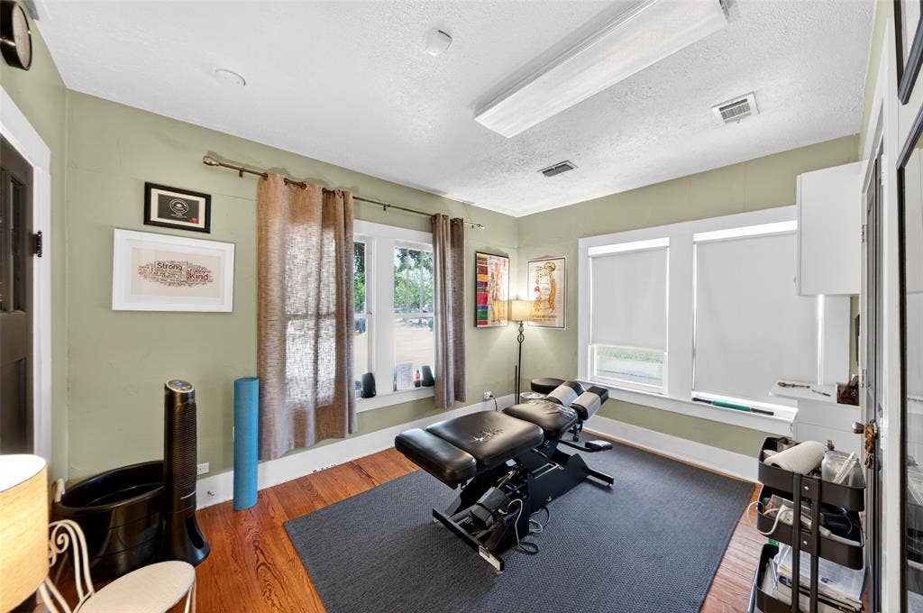 508 W Main Street, Allen, TX 75013 Hardwood flooring, multiple windows, overhead lighting, crown molding, built-in wall cabinet