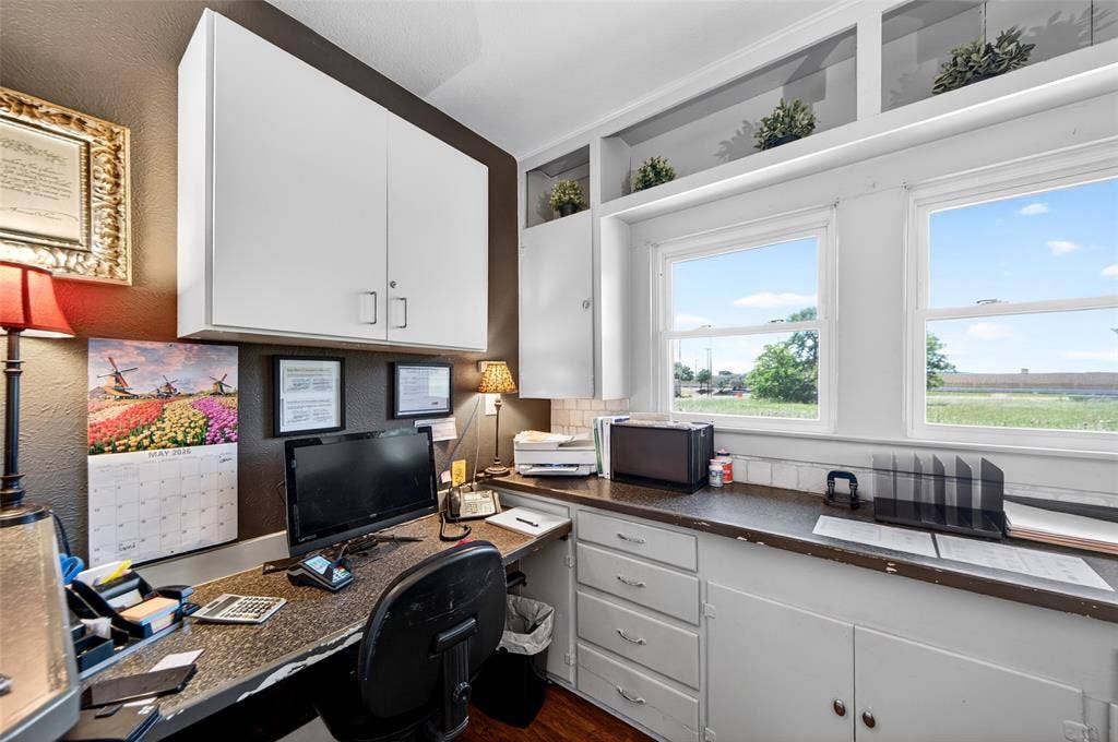 508 W Main Street, Allen, TX 75013 Dedicated workspace featuring built-in cabinetry, dual windows, and ample counter space