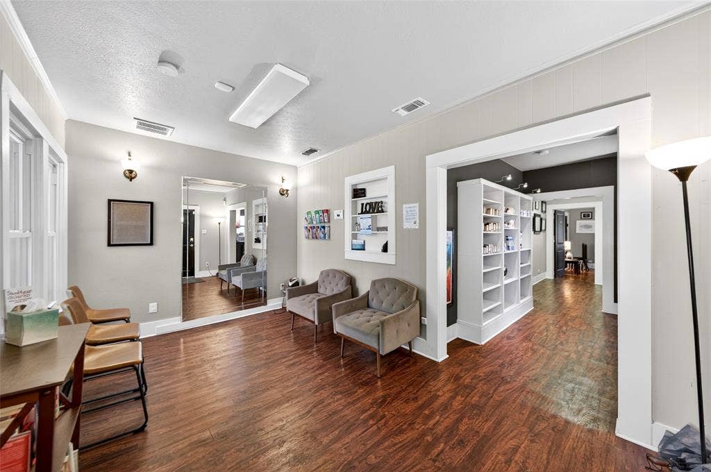 508 W Main Street, Allen, TX 75013 Wood-finish flooring, recessed lighting, and a full-height wall mirror