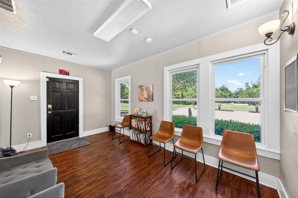 508 W Main Street, Allen, TX 75013 Wood-finish flooring with white trim and neutral wall paint