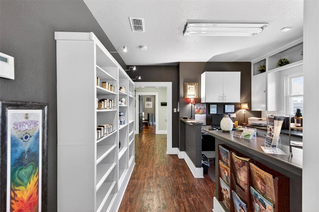 508 W Main Street, Allen, TX 75013 Wood-finish flooring, recessed lighting, and track lighting illuminate the space