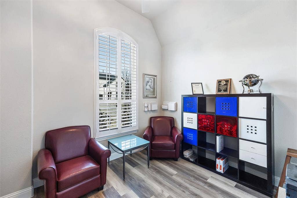 spacious front bedroom currently used as an office with walk-in closet