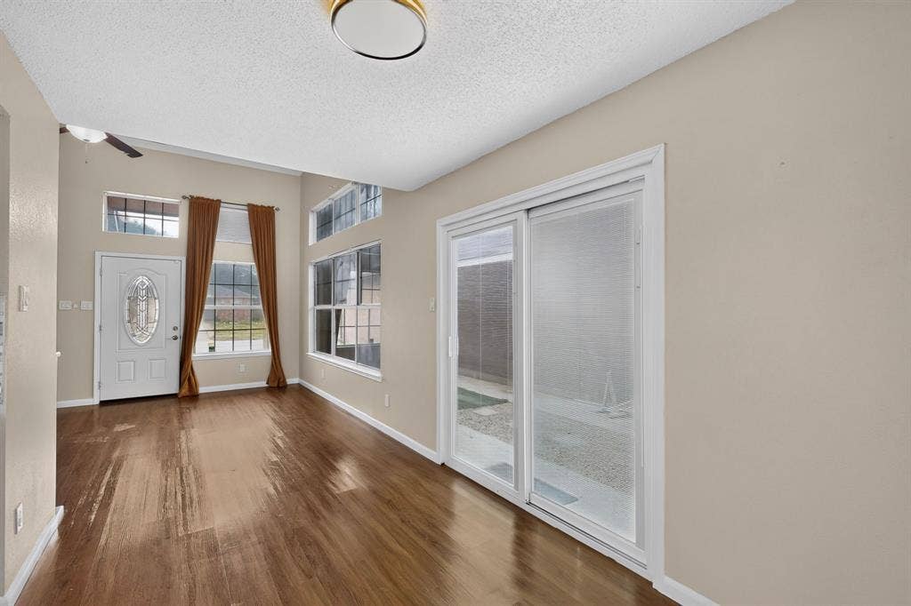 6747 Silver Sage Drive, Fort Worth, TX 76137 Wood-finish flooring throughout
