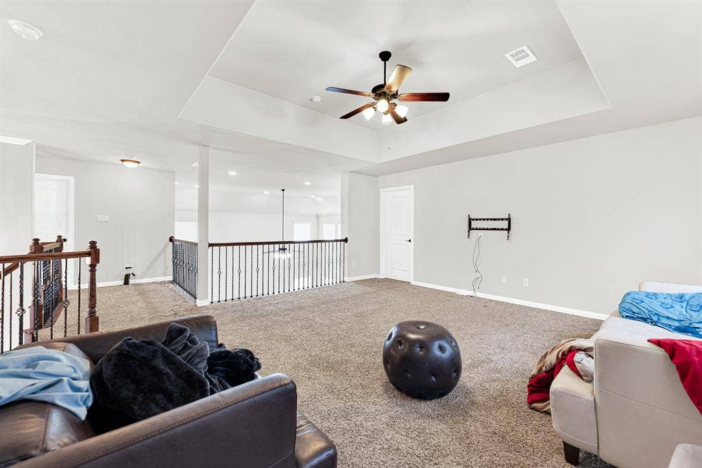12038 Big Springs Drive, Frisco, TX 75035 Wide open floor space seamlessly bridges the upper stair landing and adjacent bonus rooms. Imagine setting up a ping-pong table or play zone where kids can run free on rain-checked afternoons