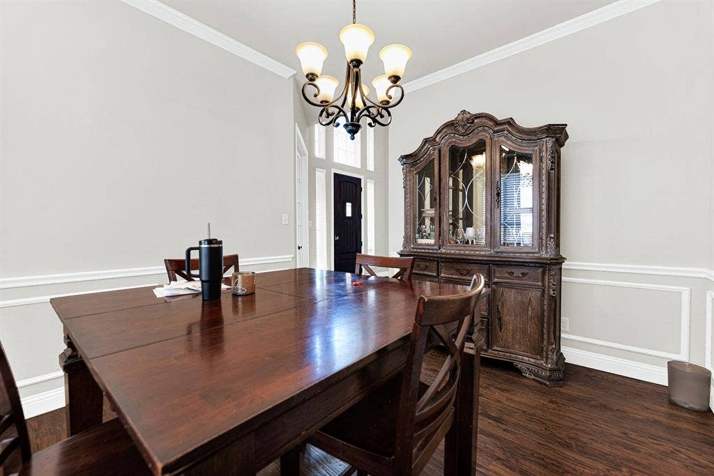 12038 Big Springs Drive, Frisco, TX 75035 The graceful, traditional chandelier acts as a stunning architectural focal point, beautifully balancing the clean lines of the walls and ceiling. Picture setting the table for a memorable Thanksgiving feast, with delicious aromas drifting in from the kitchen.