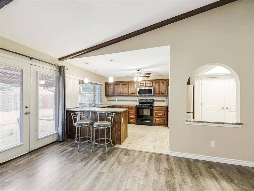 Wood-finish flooring extending into the living area