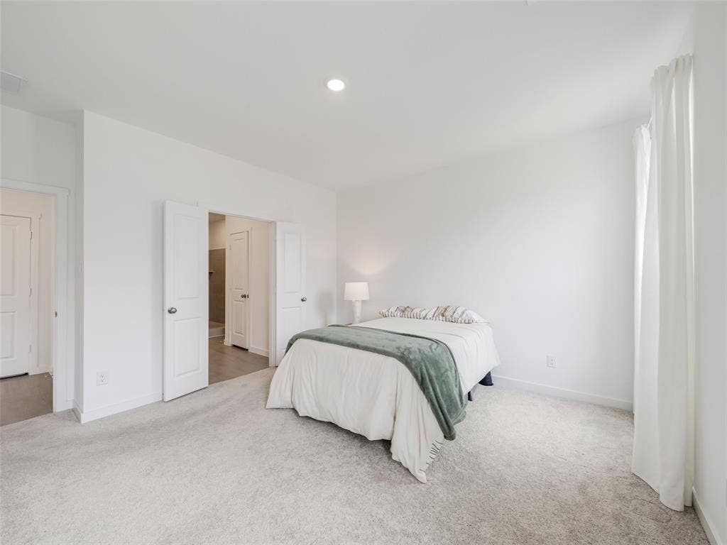 2517 Greenbelt Road, Celina, TX 75009 Recessed ceiling lighting, white walls, light-toned carpeting, and white interior doors