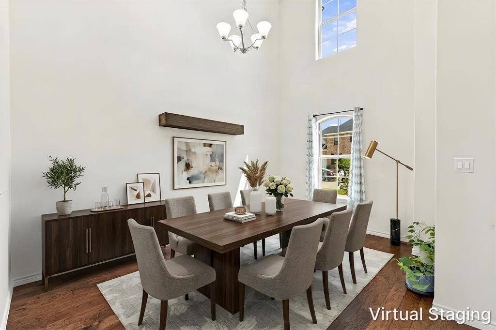 2812 Dunbar Drive, Northlake, TX 76247 Soaring ceilings with a decorative chandelier, rich wood-finish flooring, and a transom window