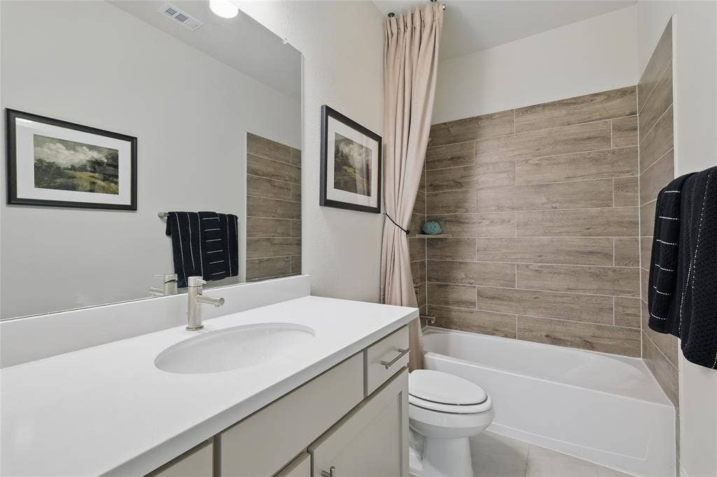 318 Trinity Court, Shady Shores, TX 76208 Model home photos of similar floorplans, not pictures of actual home.