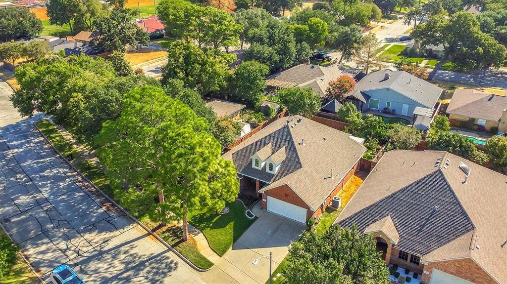 1506 Park Grove Drive, Irving, TX 75060 Residential neighborhood featuring mature trees and established homes