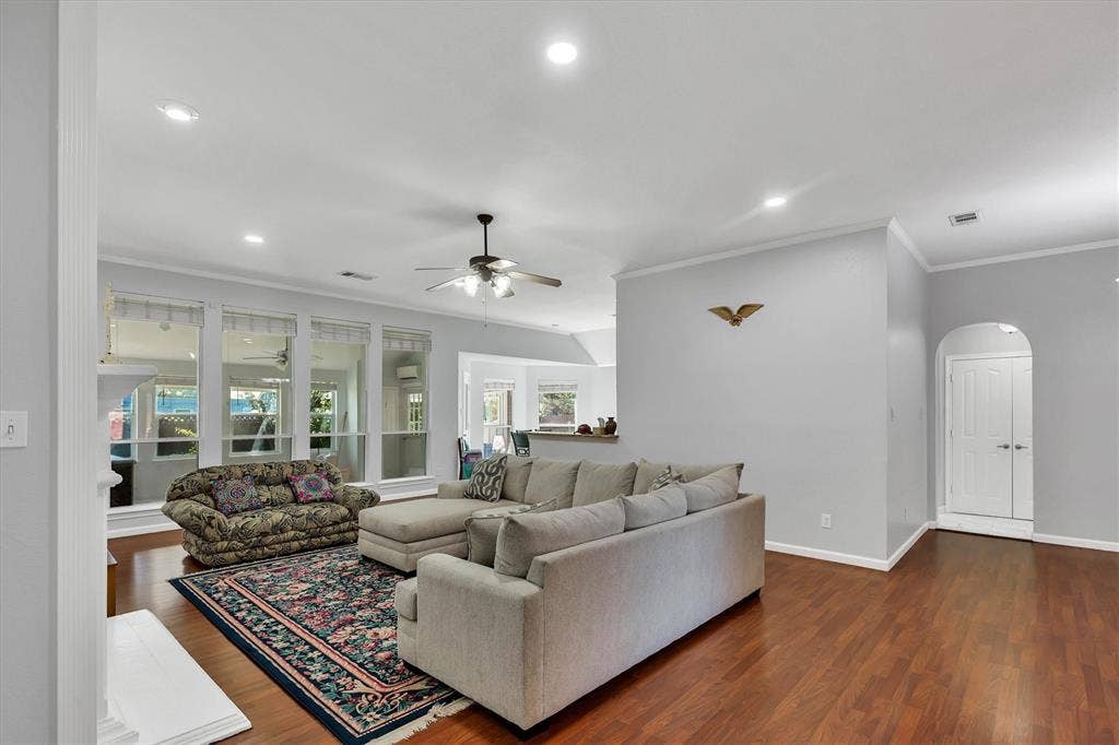 1506 Park Grove Drive, Irving, TX 75060 Spacious living area featuring wood-finish flooring, recessed lighting, and a ceiling fan