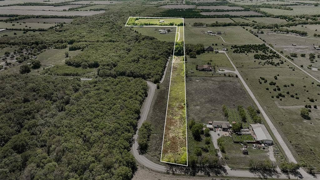 20132 County Road 818, Farmersville, TX 75442 Expansive land parcel featuring a mix of open fields and densely wooded areas