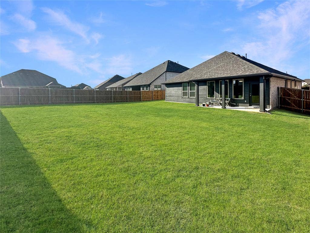 2117 Proteus Drive, Haslet, TX 76052 View of yard featuring a patio area