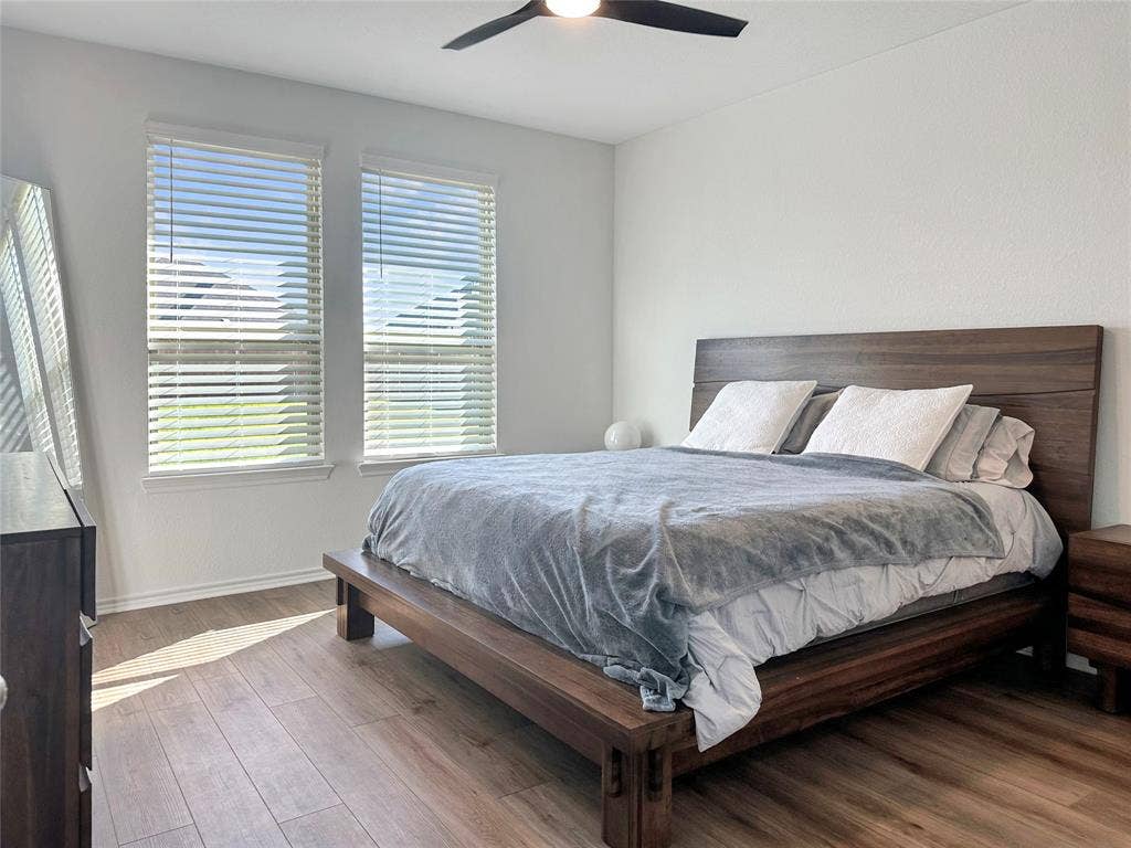 2117 Proteus Drive, Haslet, TX 76052 Bedroom with hardwood / wood-style floors and ceiling fan