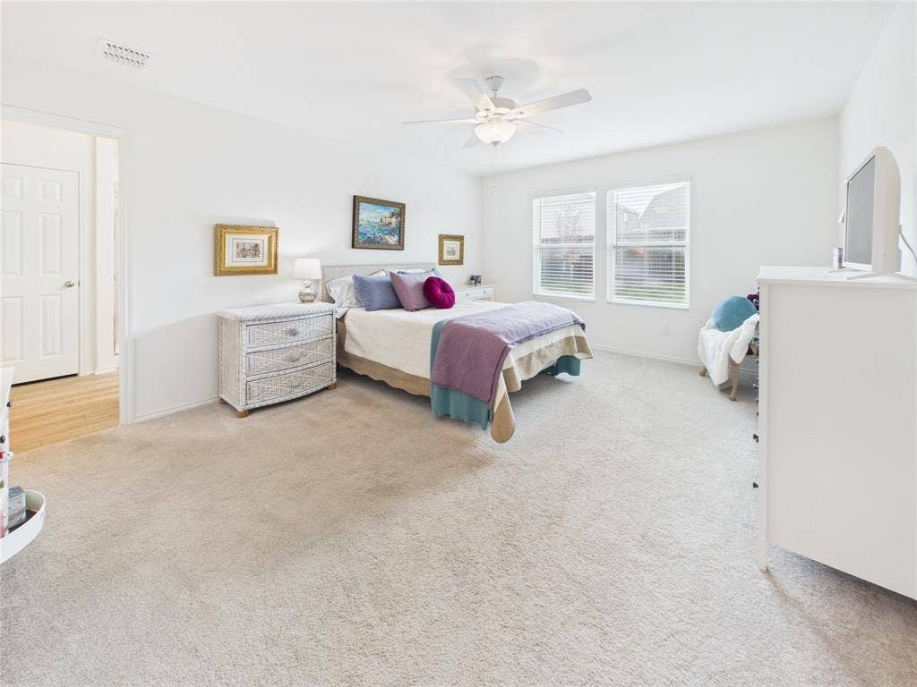 16039 Malaya Street, Haslet, TX 76052 Primary bedroom that is fit or a king and or queen with room for sitting including it own ensuite bathroom with large walk in shower, dual sinks , linen closet and walk in closet.