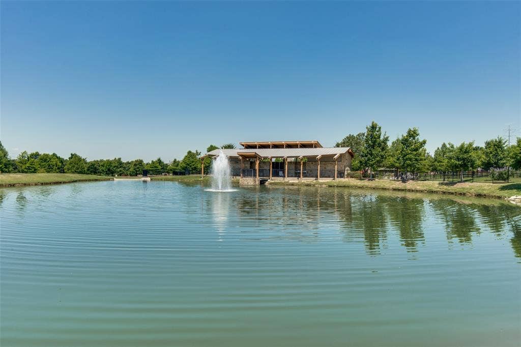 10796 Astoria Drive, Frisco, TX 75035 Enjoy the scenic community pond and peaceful outdoor spaces that add to the charm of Dominion at Panther Creek.