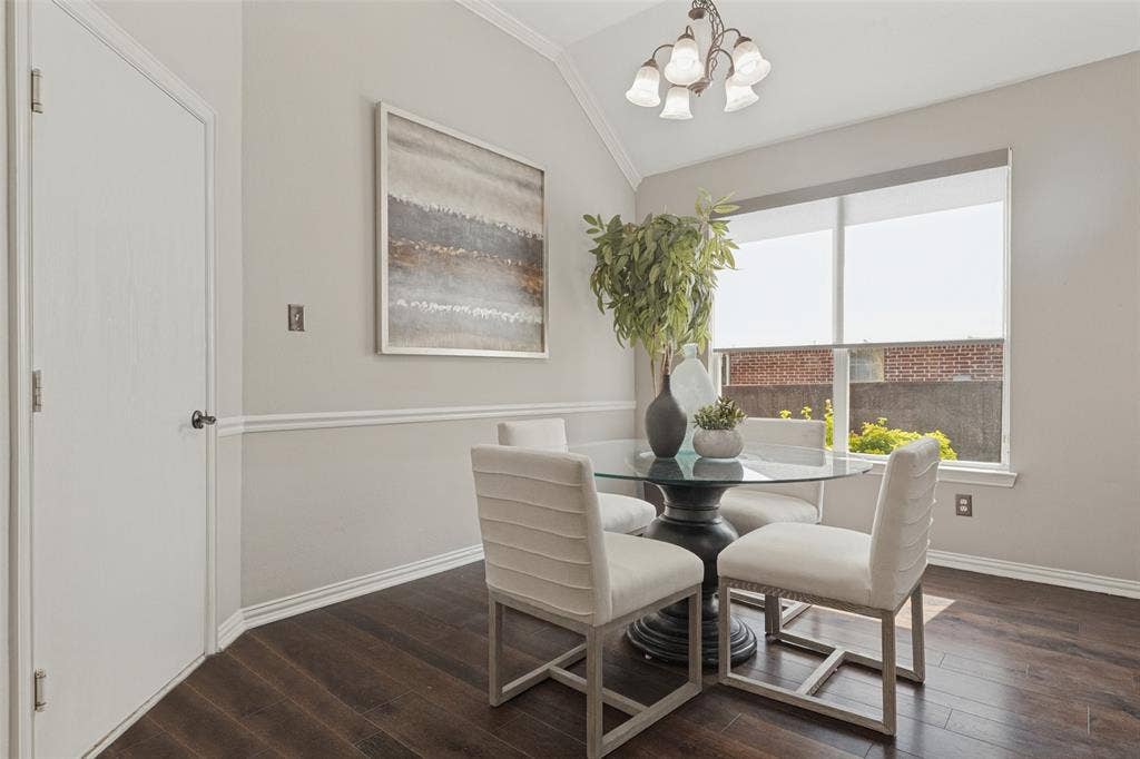 10796 Astoria Drive, Frisco, TX 75035 Bright breakfast nook just off the kitchen offers a cozy spot for casual dining, with natural light and easy access to the outdoor living space.