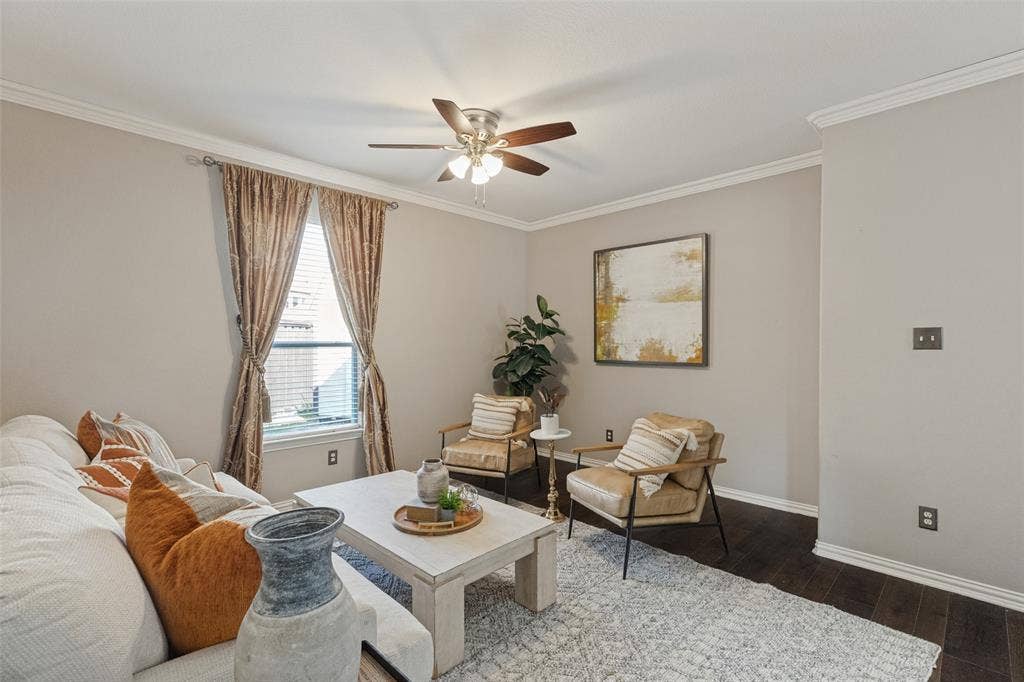 10796 Astoria Drive, Frisco, TX 75035 Versatile den/flex space provides an additional living area perfect for a home office, sitting room, playroom, or quiet retreat, featuring hardwood floors, crown molding, and plenty of natural light.