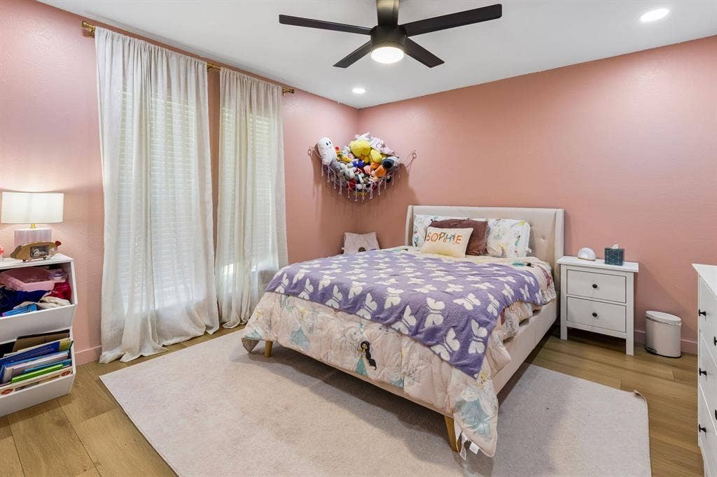 2408 Grandview Drive, Plano, TX 75075 Recessed lighting, wood-finish flooring, ceiling fan, and window treatments