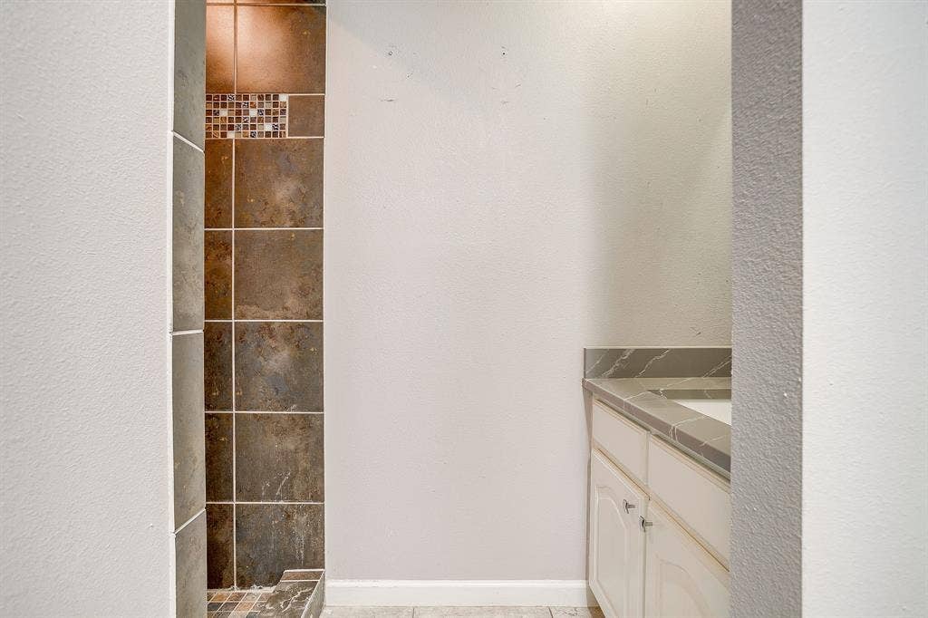 407 Llano Court, Weatherford, TX 76087 Primary bath second vanity and shower.