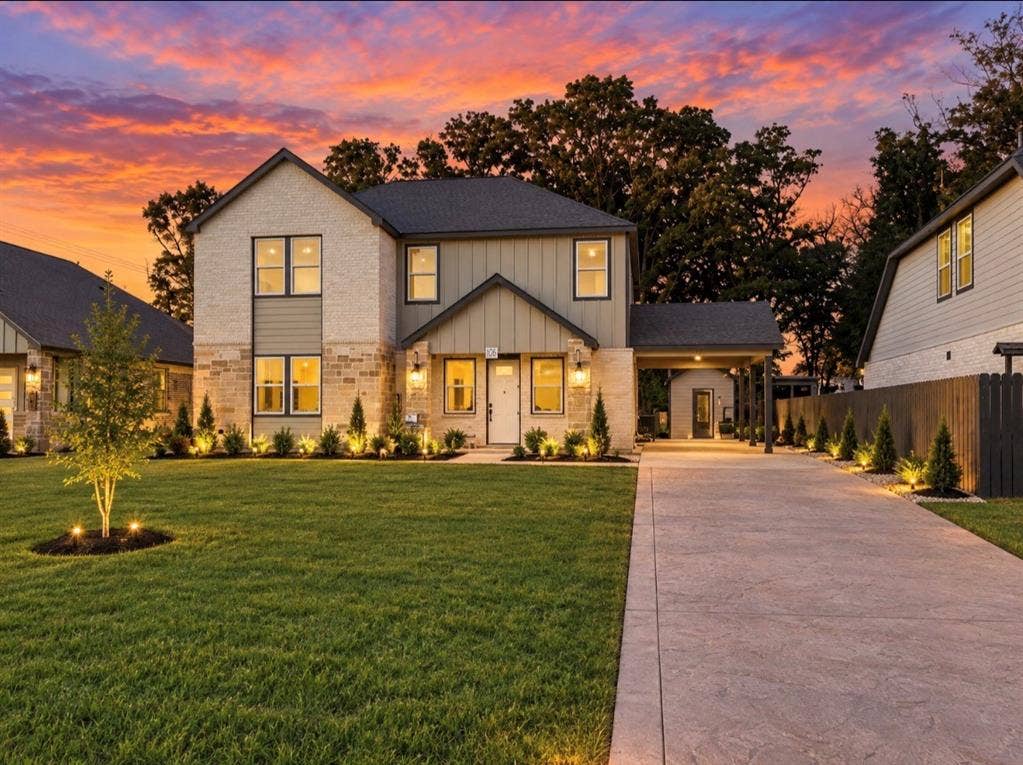 103 Water Oak Road, Trinidad, TX 75163 Two-story residence featuring brick and siding exterior, an extended covered porch entrance, and a stamped concrete driveway