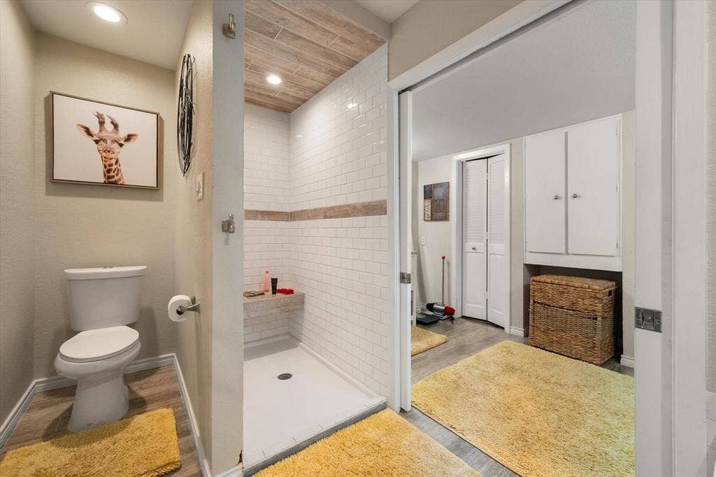 656 The Meadows Parkway, DeSoto, TX 75115 Shower with subway tile, wood-finish ceiling, and built-in bench