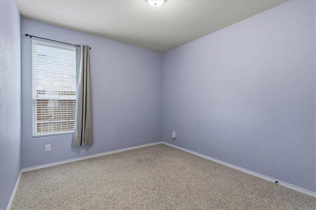 1713 Falling Star Drive, Fort Worth, TX 76052 Carpeted flooring, single window with blinds, ceiling-mounted light fixture, light-colored walls