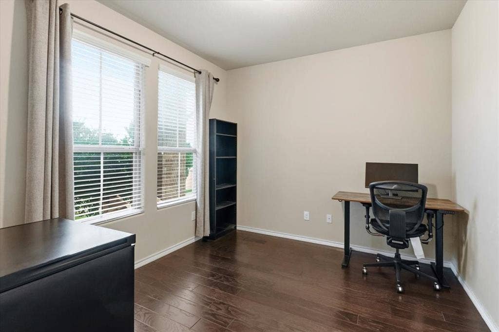 1713 Falling Star Drive, Fort Worth, TX 76052 Wood-finish flooring throughout