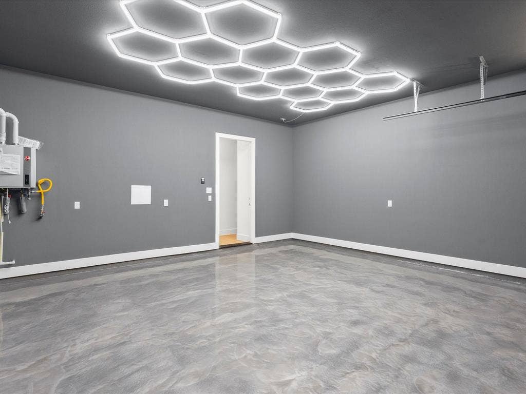 1711 Kraft Street, Dallas, TX 75212 Hexagonal ceiling lighting fixtures, and epoxy flooring.