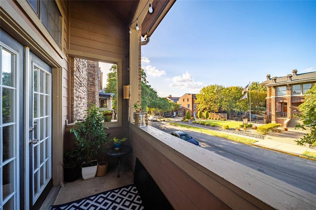 The balcony is located off the living room and has views to Binkley Ave.