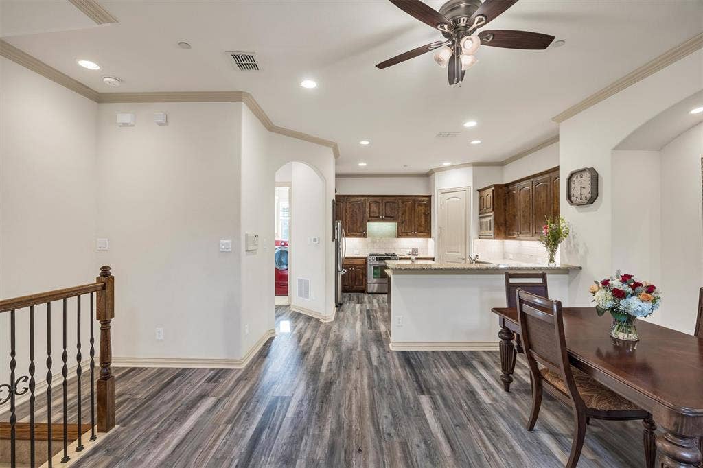 8249 Short Street, Frisco, TX 75034 Open-concept living area with wood-finish flooring, recessed lighting, and a ceiling fan