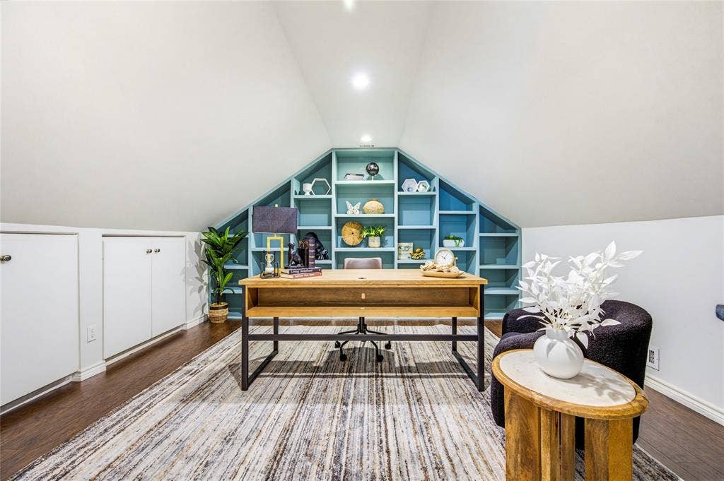 10138 Planters Row Drive, Frisco, TX 75033 Behind double doors, built-in bookshelves in a bold teal set the tone for a productive workday at home.