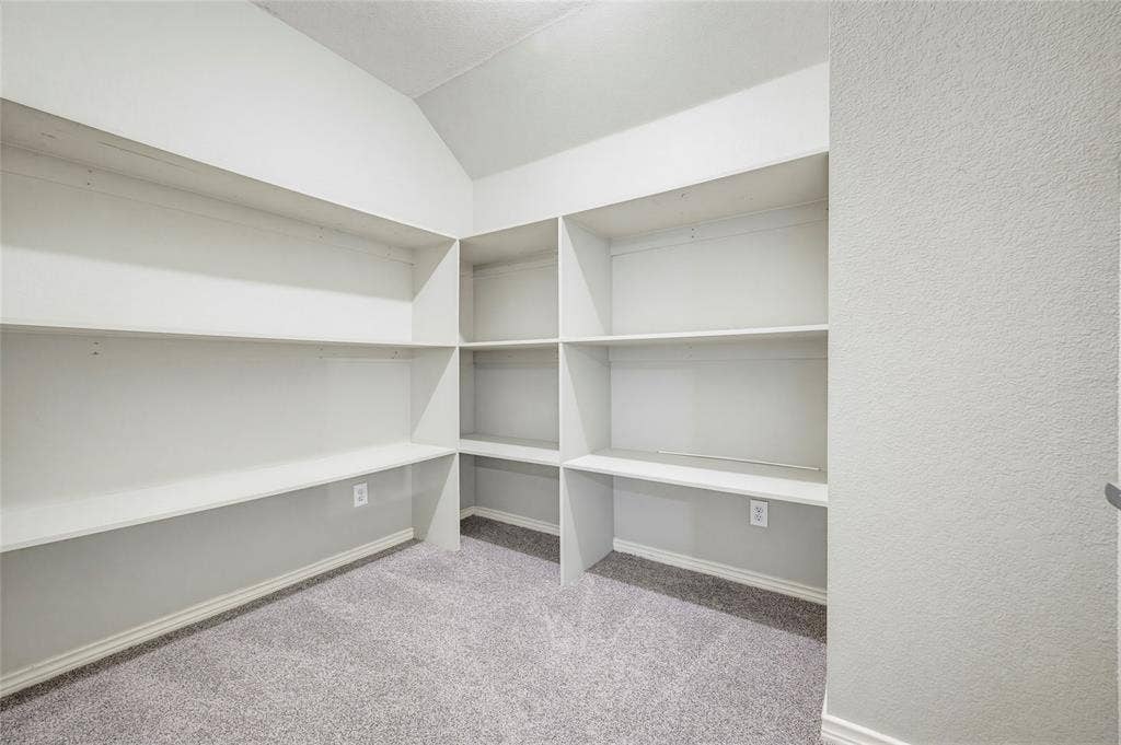 10138 Planters Row Drive, Frisco, TX 75033 An oversized storage room lined with deep built-in shelving, the unsung hero for seasonal décor, sports gear, and everything in between.