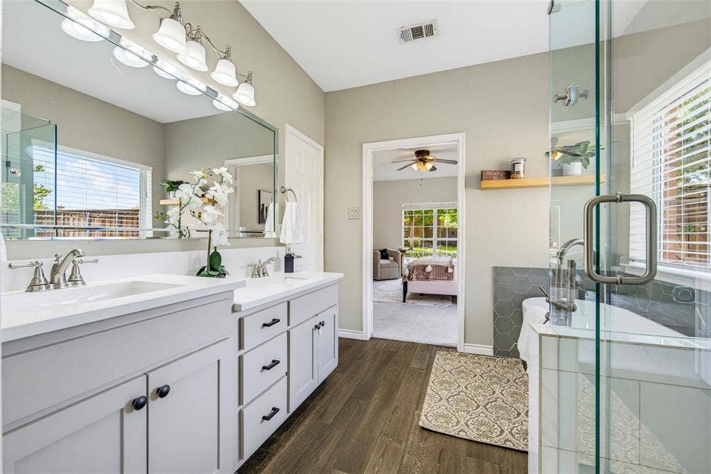 10138 Planters Row Drive, Frisco, TX 75033 Dual sinks, generous counter space, and a refreshed modern design mean no one has to share the mirror.