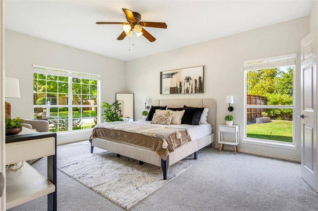 10138 Planters Row Drive, Frisco, TX 75033 The main-level primary suite offers space, privacy, and natural light pouring in from windows on two sides