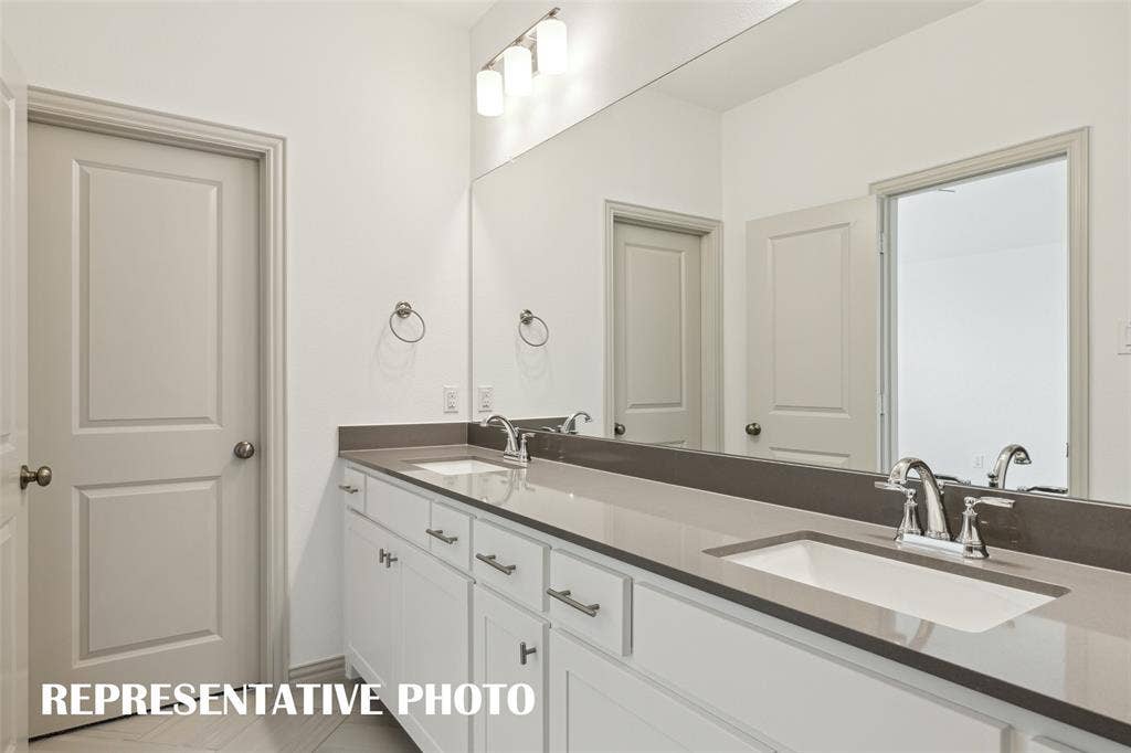 3723 Pierce Lane, Grand Prairie, TX 75052 Your new owner's bath features a double vanity offering plenty of space for two! REPRESENTATIVE PHOTO