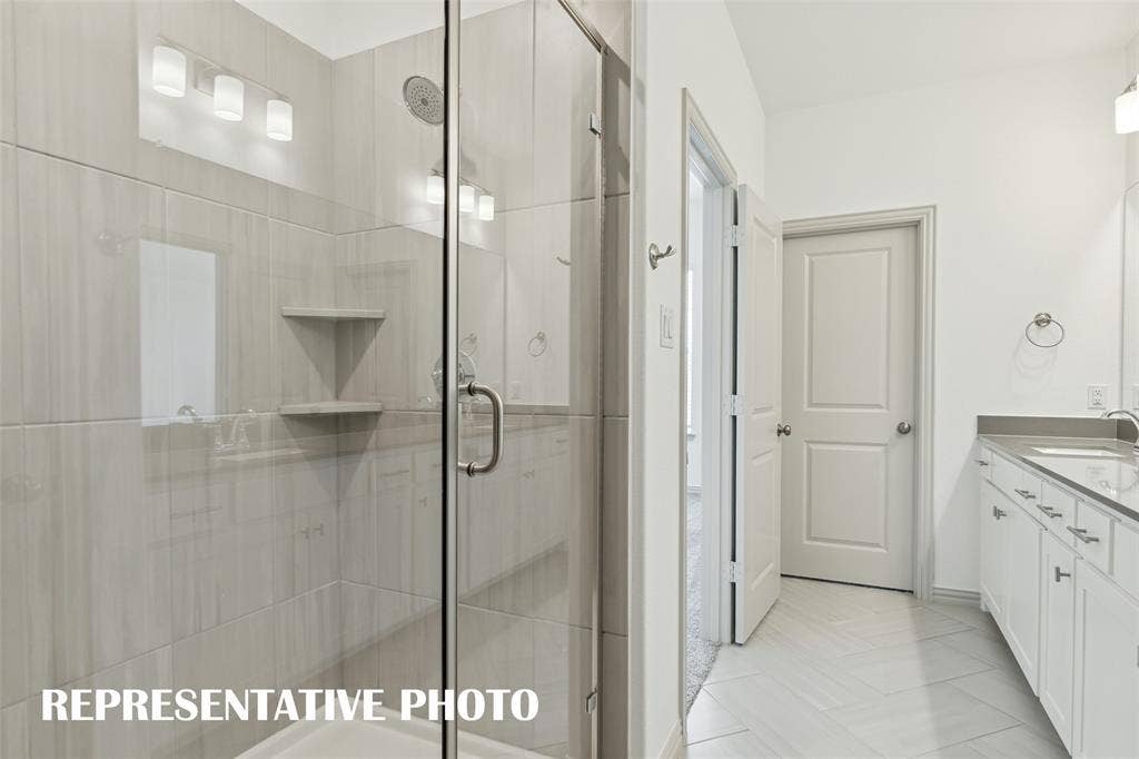 3723 Pierce Lane, Grand Prairie, TX 75052 The spacious walk in shower is the perfect place to start or end your day! REPRESENTATIVE PHOTO