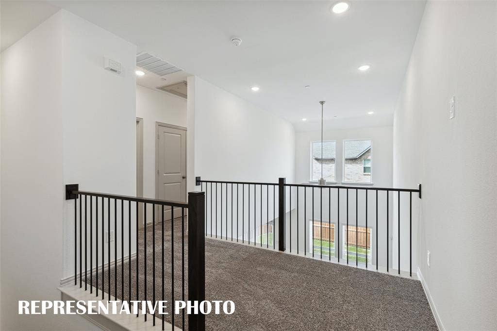 3723 Pierce Lane, Grand Prairie, TX 75052 The loft area in our Baycliff plan features open railings that create a light filled space perfect for a reading nook or pocket office! REPRESENTATIVE PHOTO