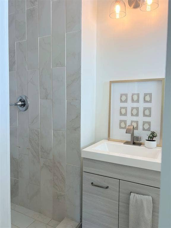 1200 Daisy Lane, Irving, TX 75061 Tiled shower surround with a chrome shower control