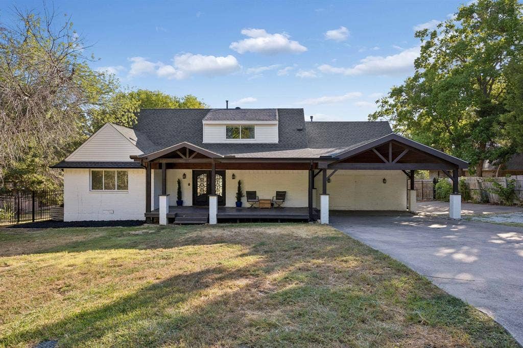This canal front home has its own boat ramp and a HUGE fully fenced back yard!