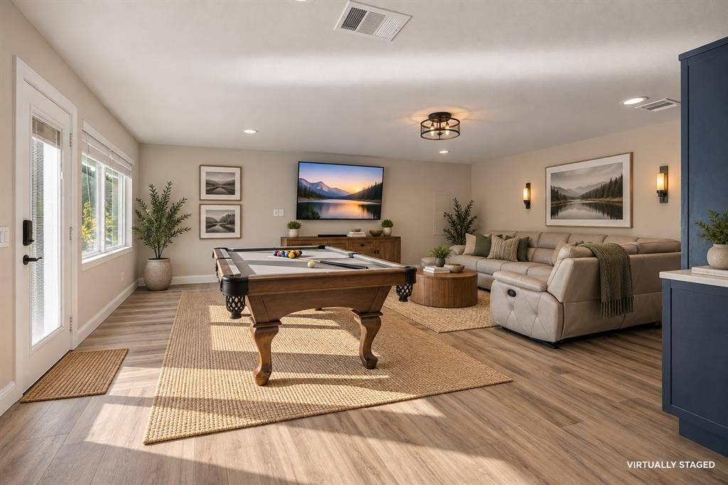 This game room could easily be a family room with a huge dining room off of the kitchen.