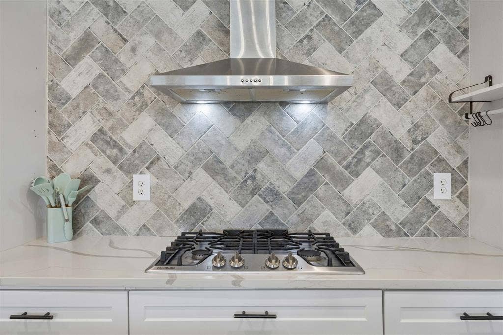 The focal point of the kitchen, herringbone backsplash!