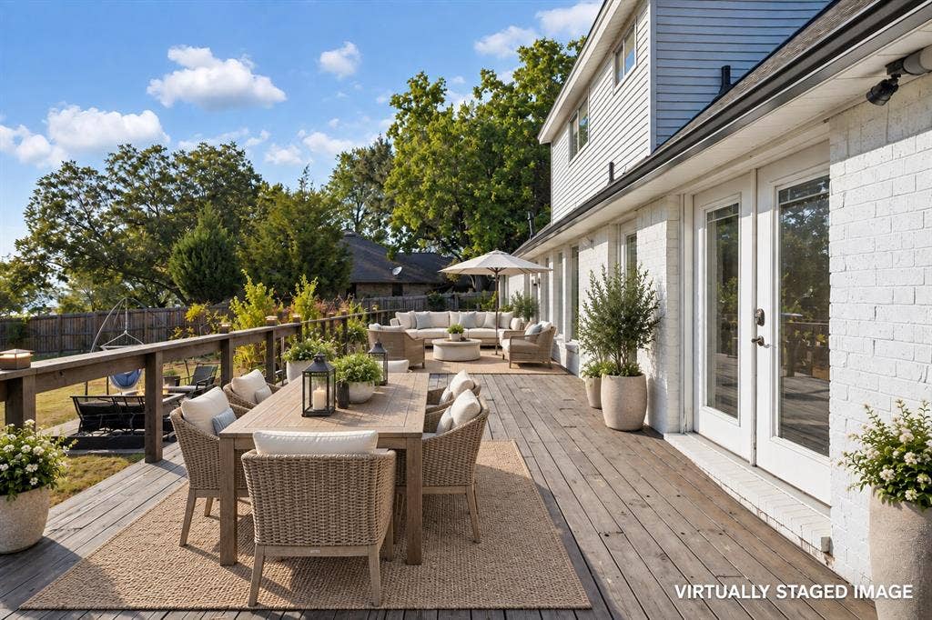 Huge back patio overlooking the giant back yard.