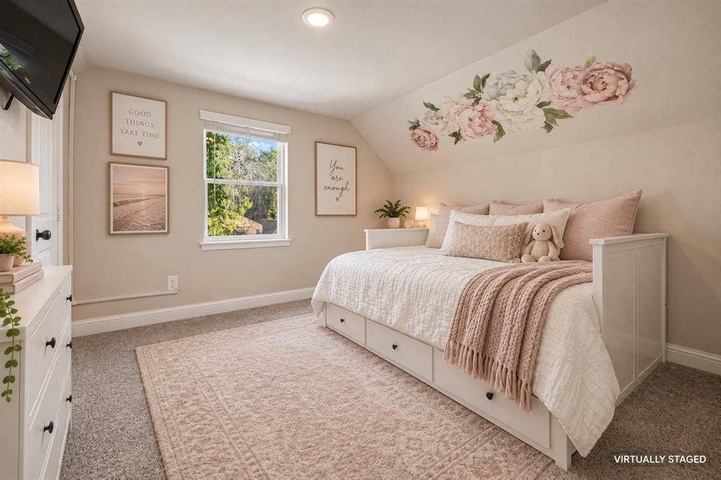 one of 3 secondary bedrooms upstairs.