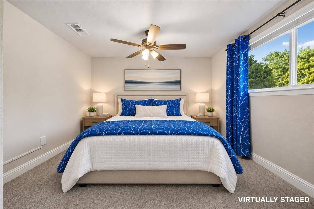one of 3 secondary bedrooms upstairs.